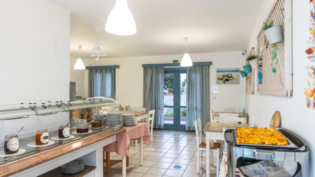 Kuchyň nebo kuchyňský kout v ubytování Marilisa Hotel