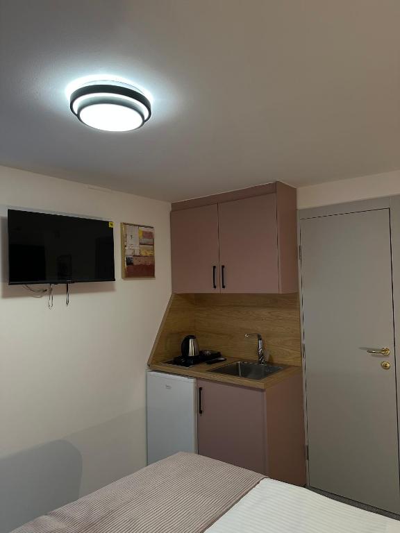 Kuchyň nebo kuchyňský kout v ubytování Alinar Oasis Apartments