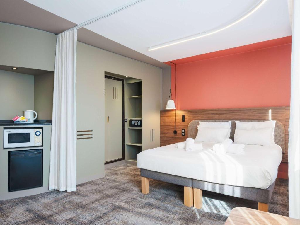 Kuchyň nebo kuchyňský kout v ubytování Novotel Suites Nancy Centre