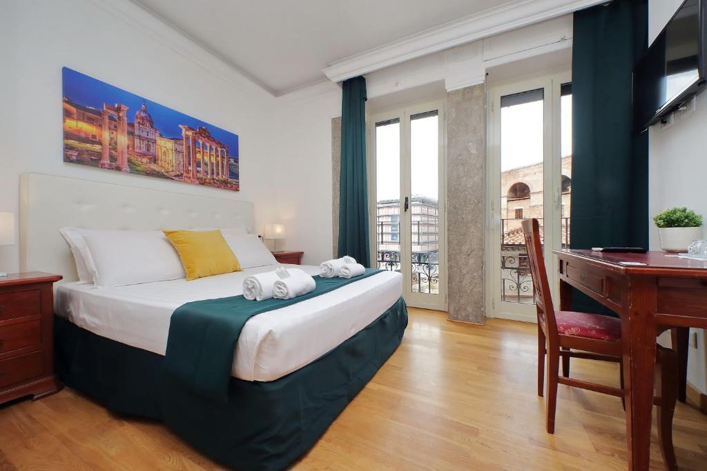 Postel nebo postele na pokoji v ubytování Romulus Rooms
