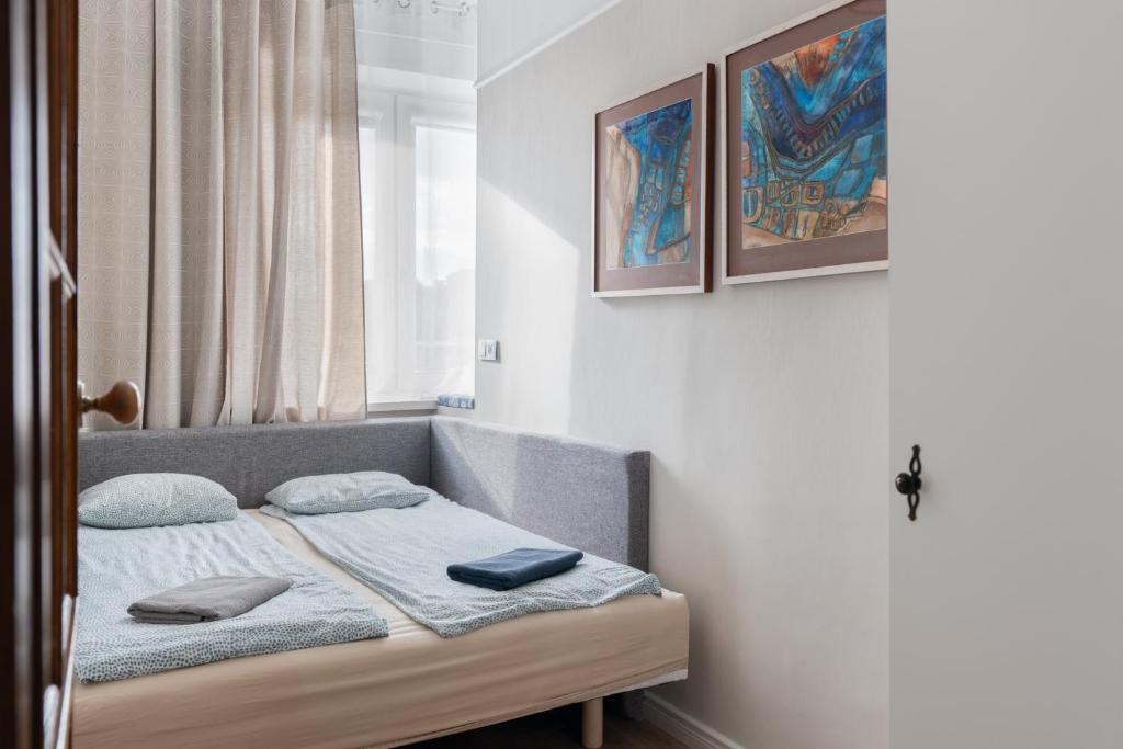 Posteľ alebo postele v izbe v ubytovaní Blue Apartment Rajska