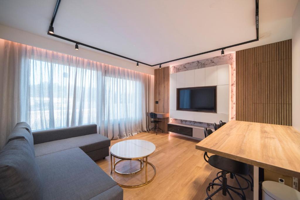 TV a/nebo společenská místnost v ubytování Apartment Legacy