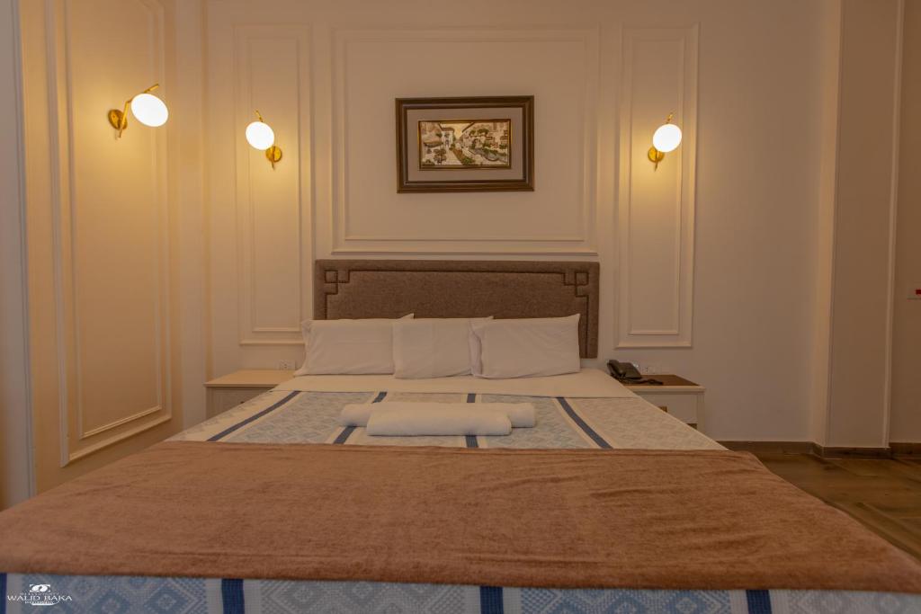 Postel nebo postele na pokoji v ubytování El Farida Hotel