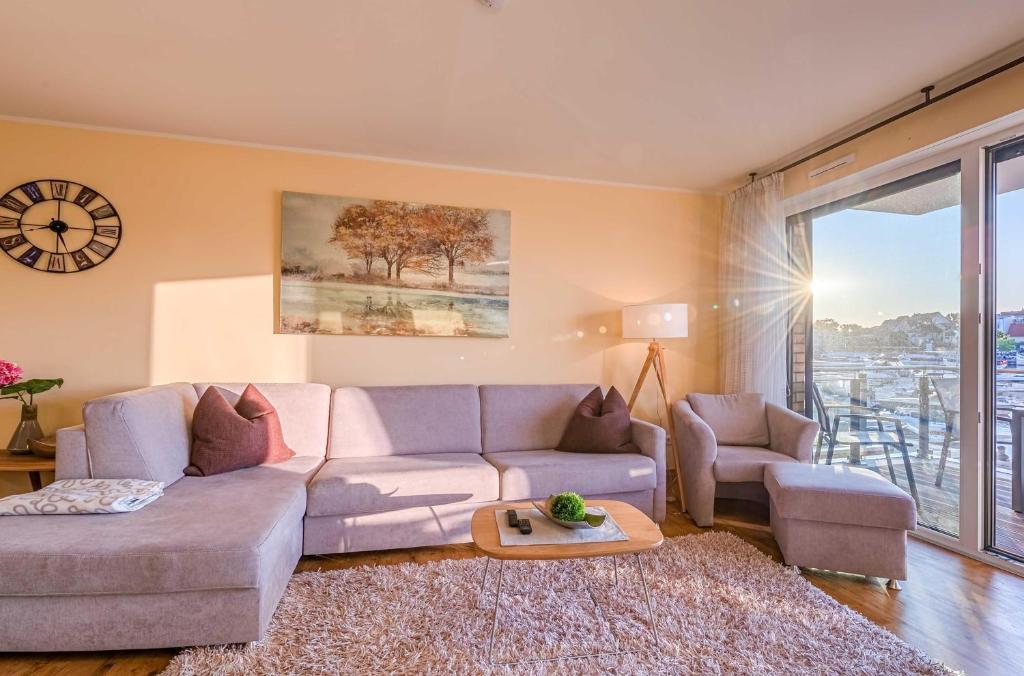 Posezení v ubytování Hafenidylle - Apartment in der Hafenresidenz mit Balkon & Wellness