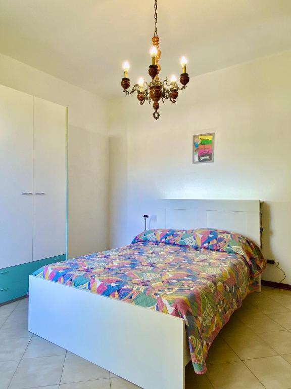 Postel nebo postele na pokoji v ubytování Appartamento Bimba in Toscana
