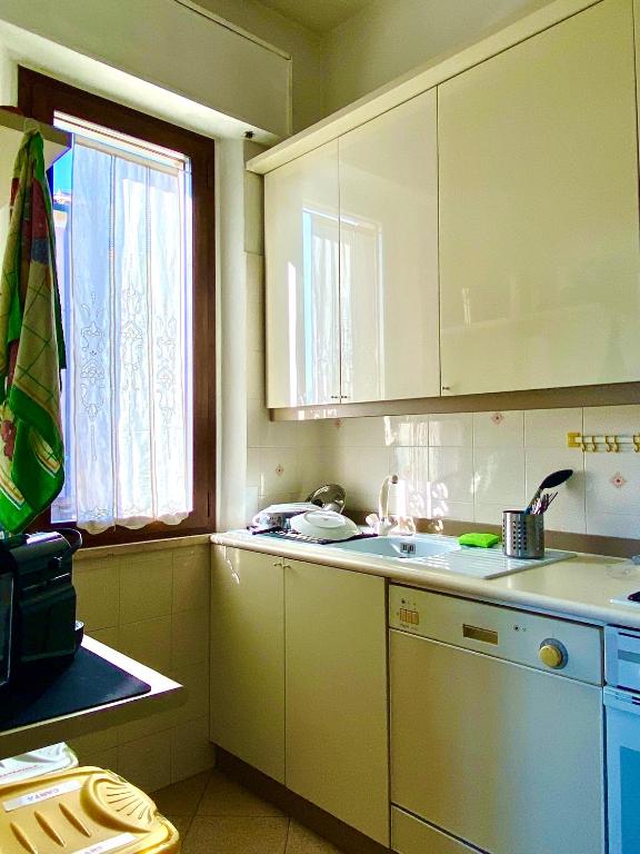 Kuchyň nebo kuchyňský kout v ubytování Appartamento Bimba in Toscana