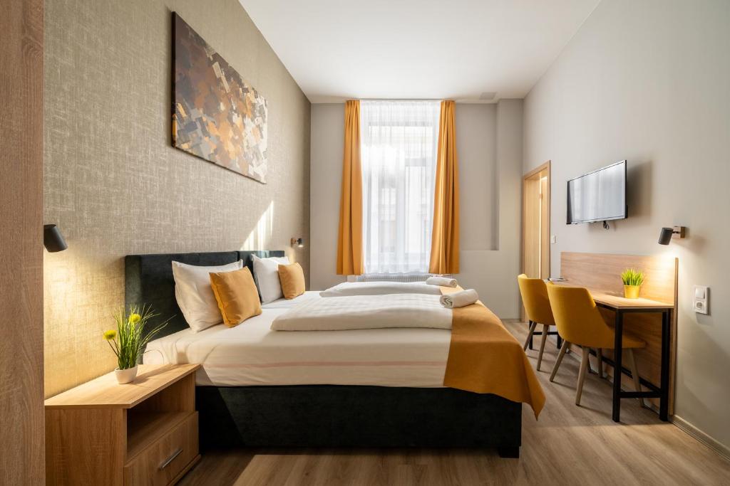 Postel nebo postele na pokoji v ubytování Full Moon Budapest