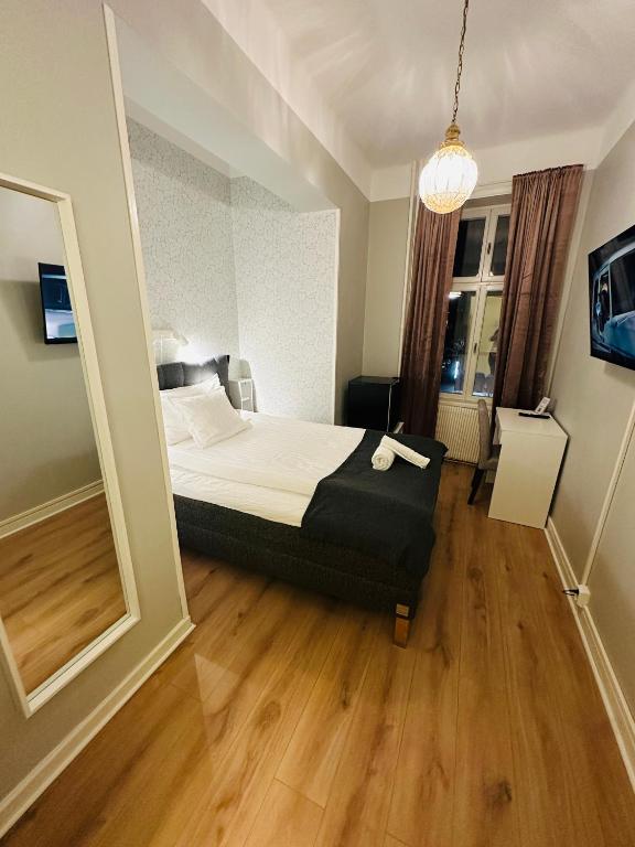 Vattengrändens Vandrarhem & Hotel Norrköping - Eenpersoonskamer Met Gedeelde Badkamer