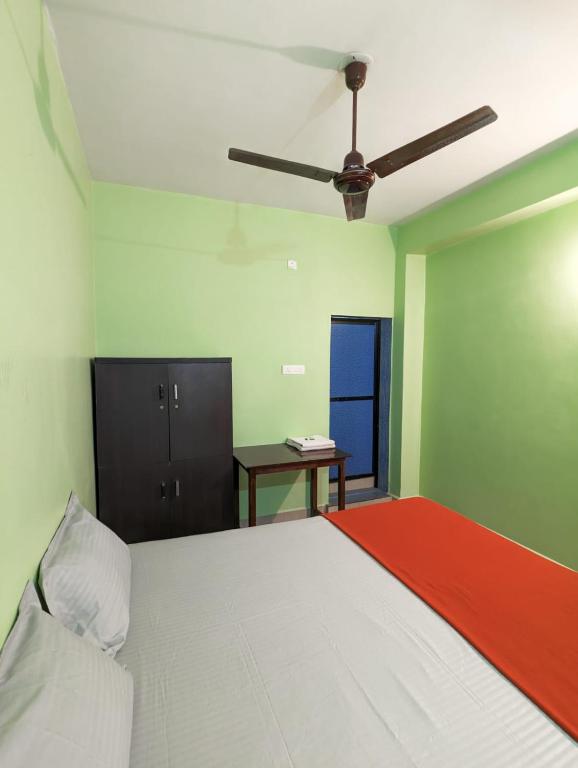 Postel nebo postele na pokoji v ubytování Luciano Guest House
