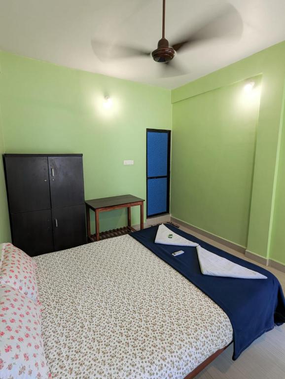 Postel nebo postele na pokoji v ubytování Luciano Guest House