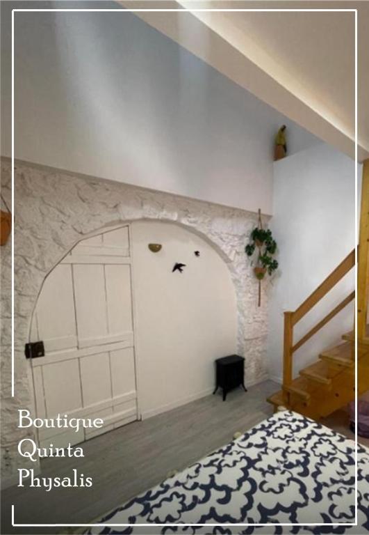 Postel nebo postele na pokoji v ubytování Boutique Quinta Physalis
