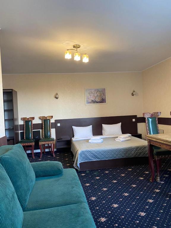 Postel nebo postele na pokoji v ubytování Faraon Hotel