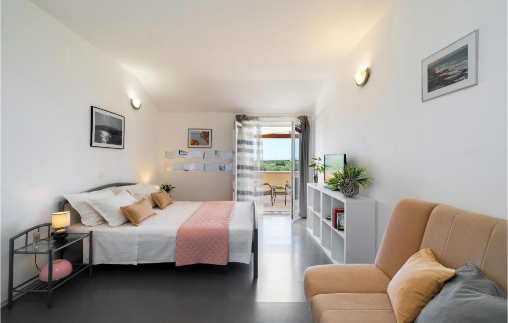 Posteľ alebo postele v izbe v ubytovaní Cozy Home In Vela Luka With Sauna