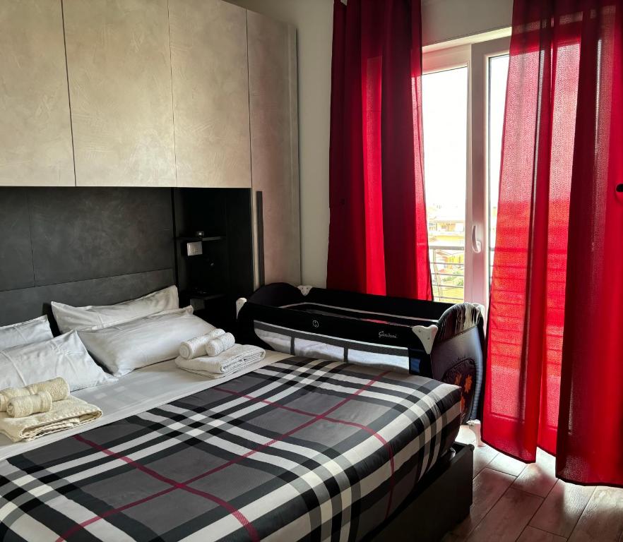Postel nebo postele na pokoji v ubytování Casa Larry