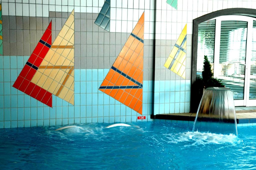Bazén v ubytování HOTEL SPA MONTANA nebo v jeho okolí