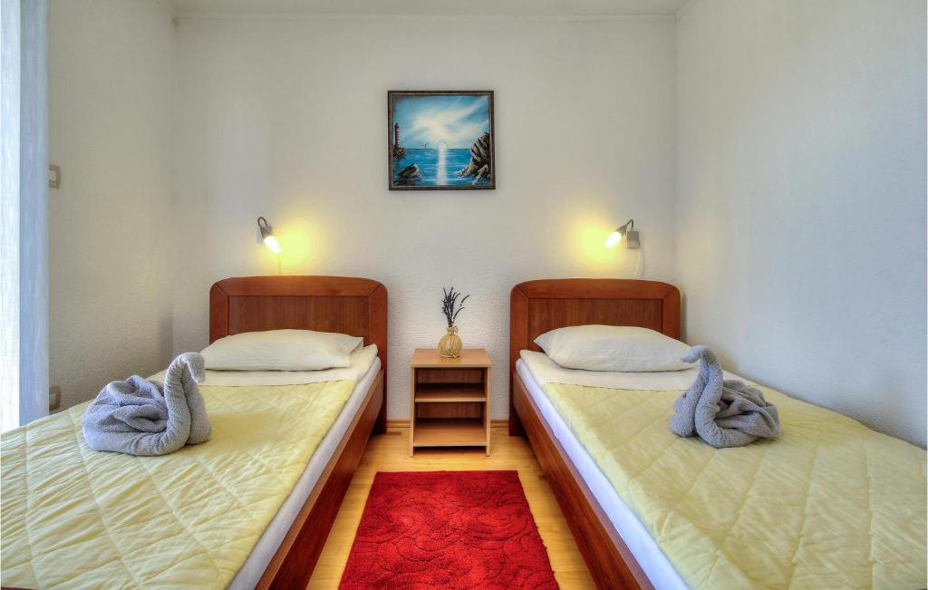 Posteľ alebo postele v izbe v ubytovaní Nice Home In Buje With Wifi