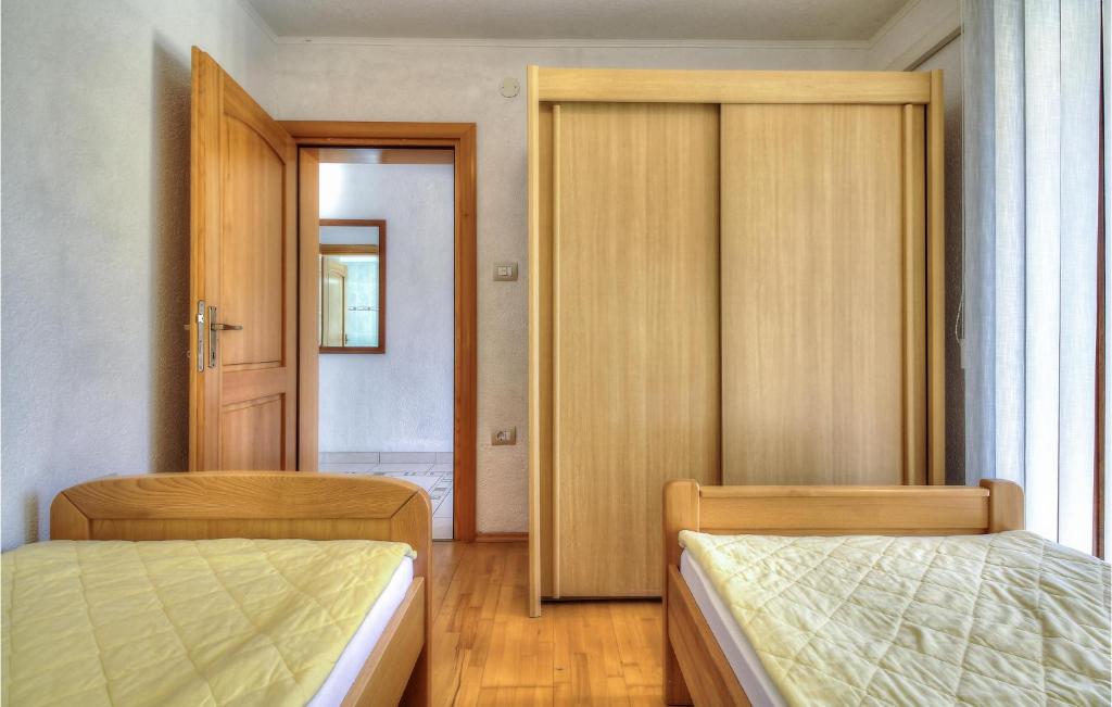 Posteľ alebo postele v izbe v ubytovaní Nice Home In Buje With Wifi
