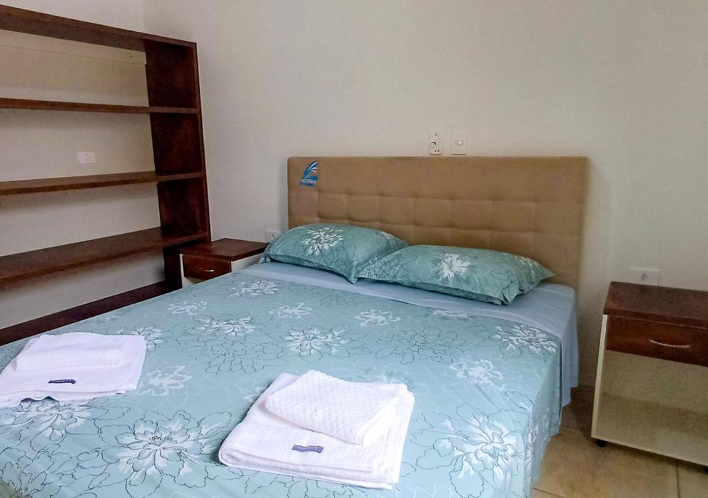 Postel nebo postele na pokoji v ubytování Pousada Nereidas