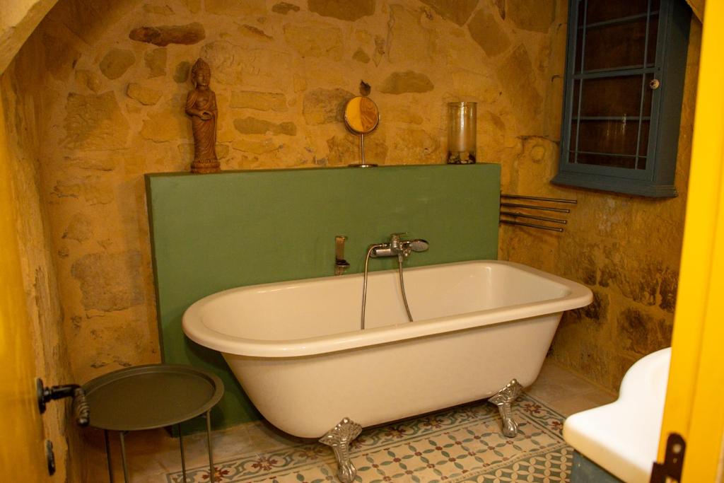 Vannituba majutusasutuses Unique Village Hideaway
