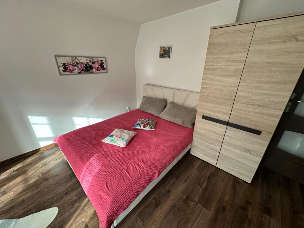 Posteľ alebo postele v izbe v ubytovaní Gdańskie Apartamenty - Apartamenty na Świetego Ducha z 2 sypialniami