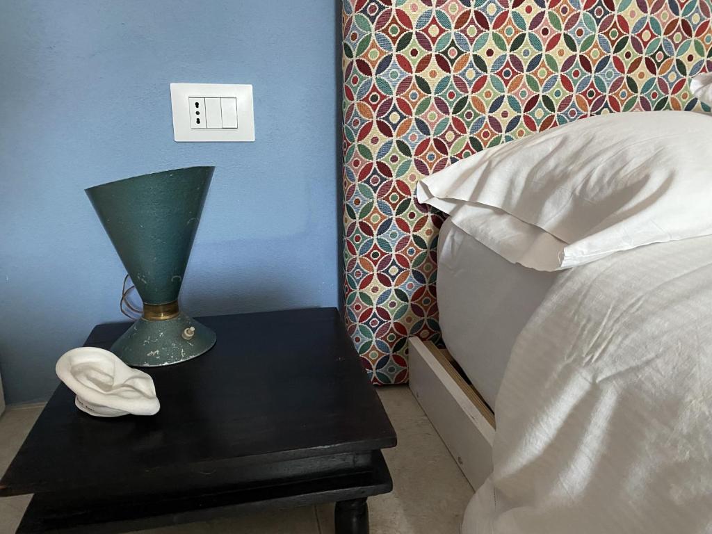 Postel nebo postele na pokoji v ubytování CasapiuHolidaySicilia-Adults Only