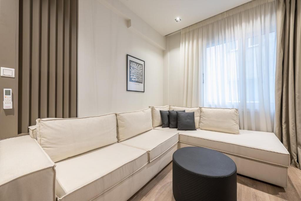 Postel nebo postele na pokoji v ubytování Aeiphoria Suites & Rooms - Athens