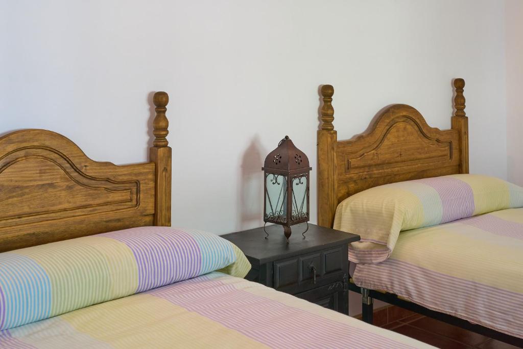 Postel nebo postele na pokoji v ubytování Casa Ginés