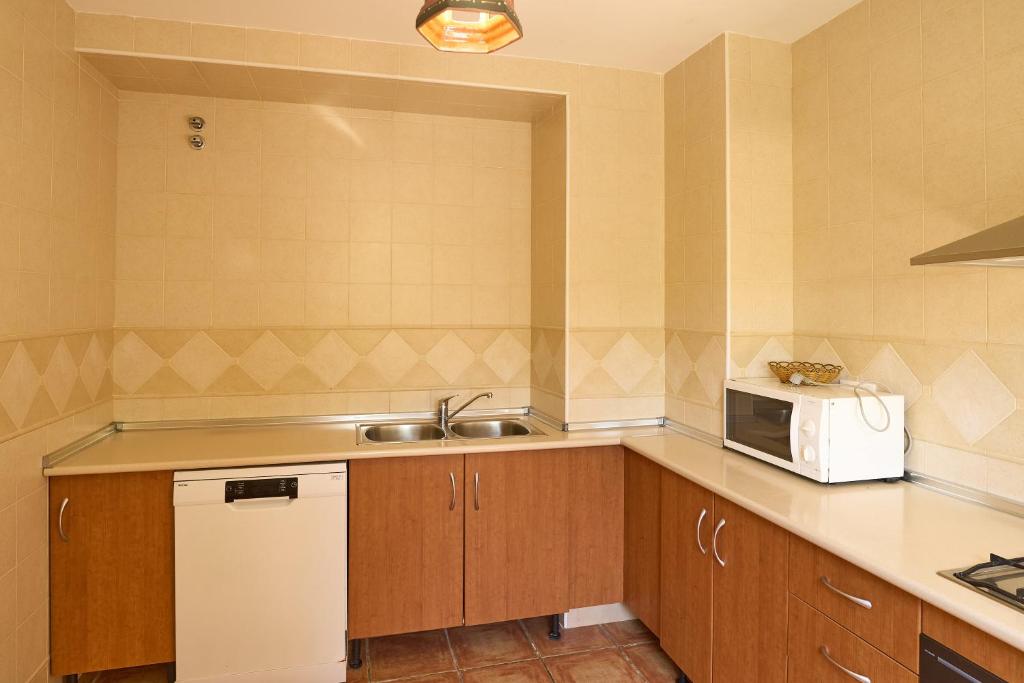 Kuchyň nebo kuchyňský kout v ubytování Casa Ginés