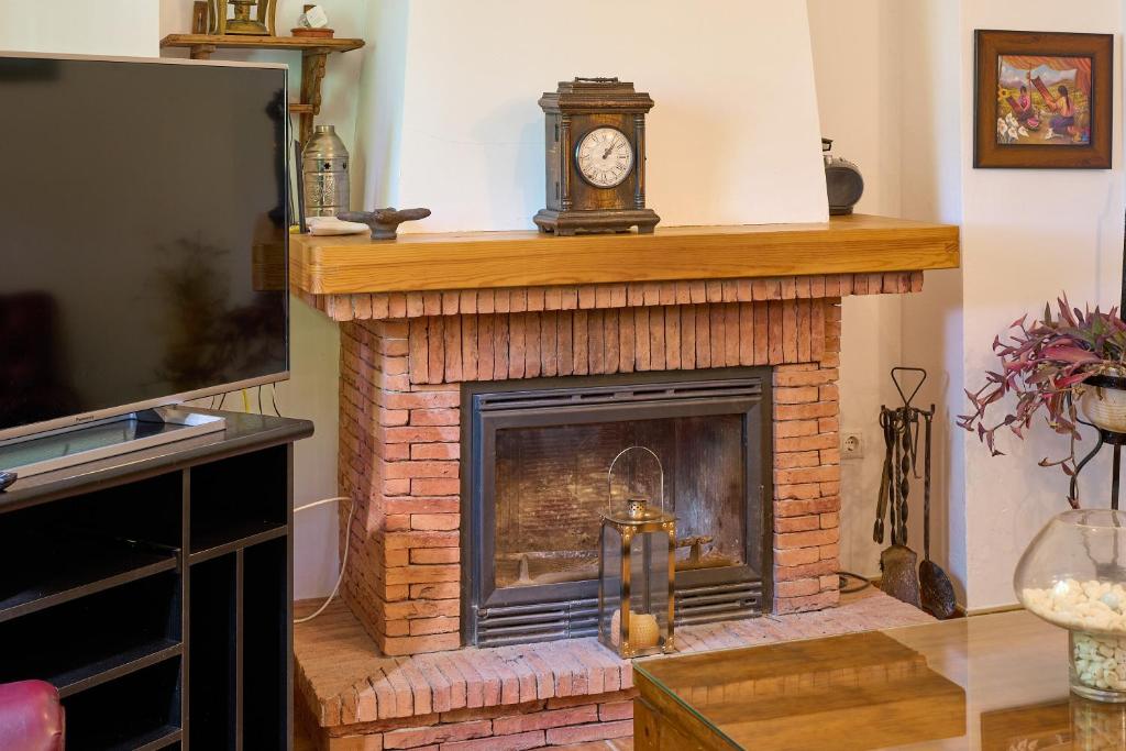 TV a/nebo společenská místnost v ubytování Casa Ginés