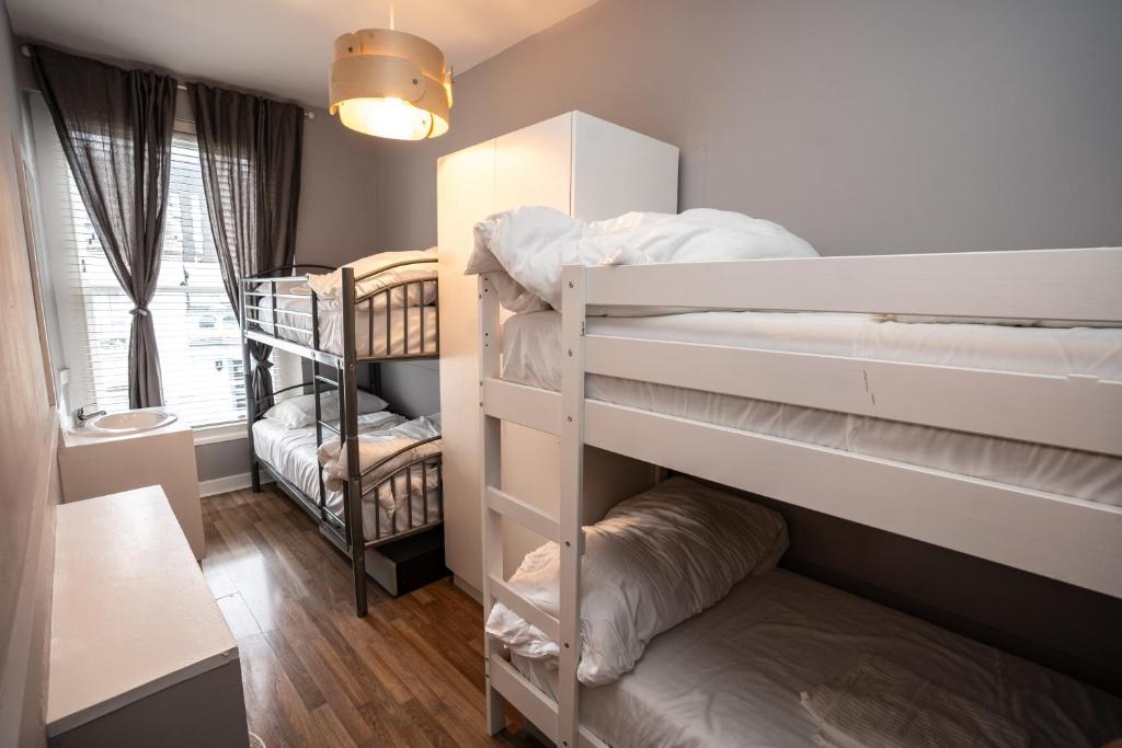 Postel nebo postele na pokoji v ubytování Talbot Street Guest House
