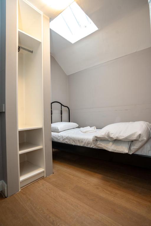 Postel nebo postele na pokoji v ubytování Talbot Street Guest House