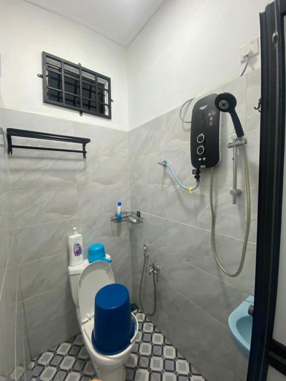 Koupelna v ubytování KZ Roomstay