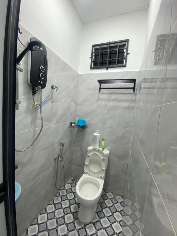 Koupelna v ubytování KZ Roomstay