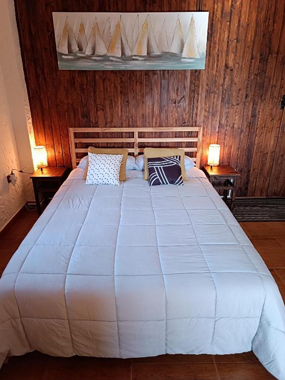 Postel nebo postele na pokoji v ubytování Cortijo Petra