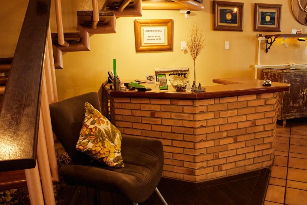 Posezení v ubytování Rogai Hotel Pousada