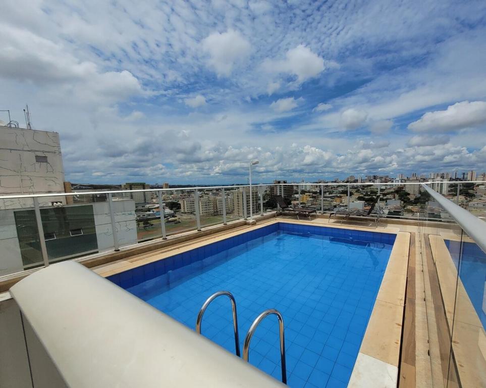 a swimming pool on the roof of a building at Samambaia East Side · Comfort in Samambaia in Brasilia