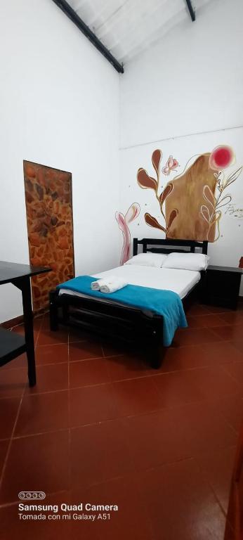 Postel nebo postele na pokoji v ubytování Hostal posada San jose