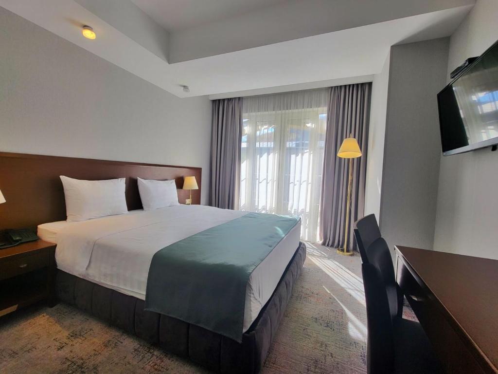 Postel nebo postele na pokoji v ubytování A5 Hotel