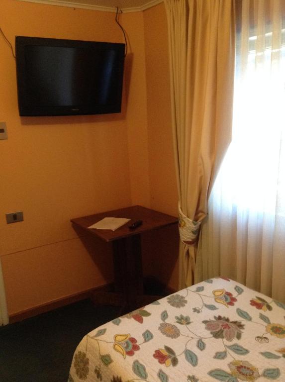 Postel nebo postele na pokoji v ubytování Hotel Le Mirage