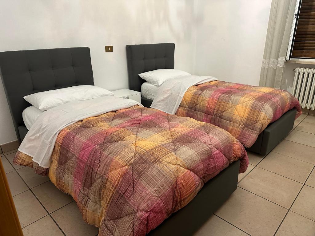 Postel nebo postele na pokoji v ubytování Seldas House