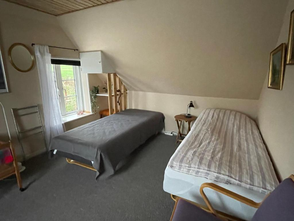 Voodi või voodid majutusasutuse Bøgebjerggård toas