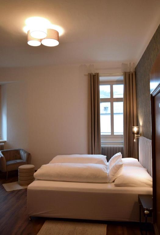 Postel nebo postele na pokoji v ubytování Cafe Zentral, Zimmer mit Frühstück