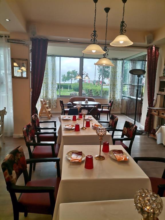 Posezení v ubytování Hotel Al Faro Lodge am See