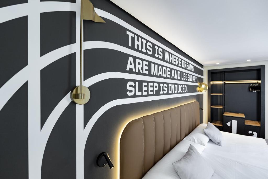 Postel nebo postele na pokoji v ubytování Hotel Magic Sports 4