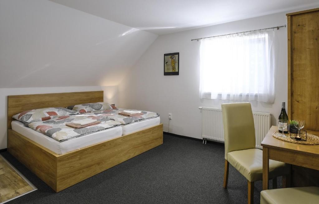 Postel nebo postele na pokoji v ubytování Villa Michaela