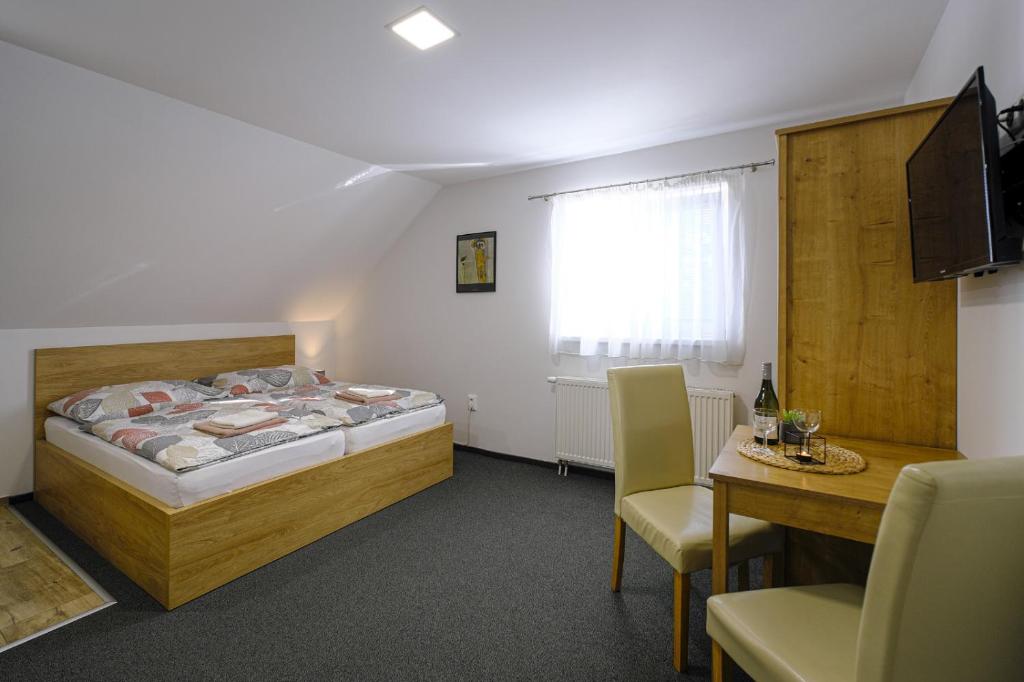 Postel nebo postele na pokoji v ubytování Villa Michaela