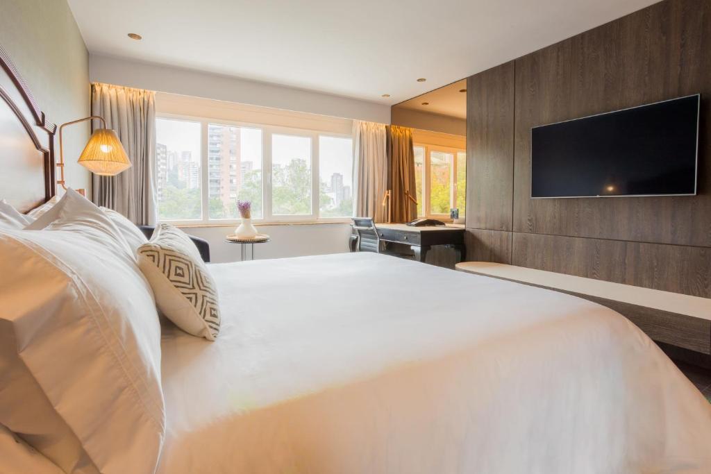 Postel nebo postele na pokoji v ubytování InterContinental Medellin - Movich by IHG