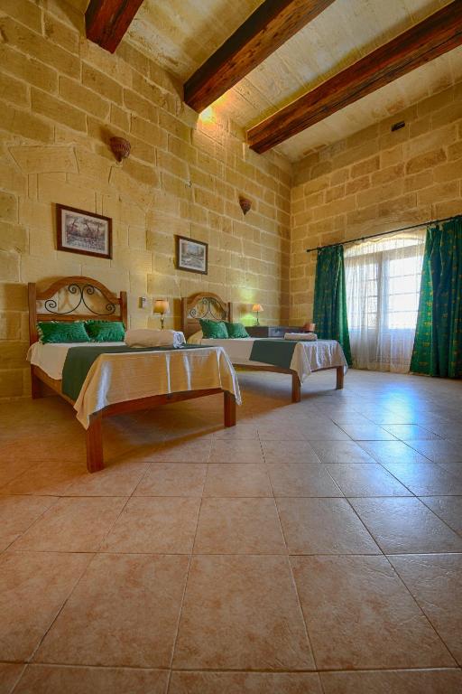 Fotografie z fotogalerie ubytování Farmhouse Razzett Ta' Twil v destinaci Għarb