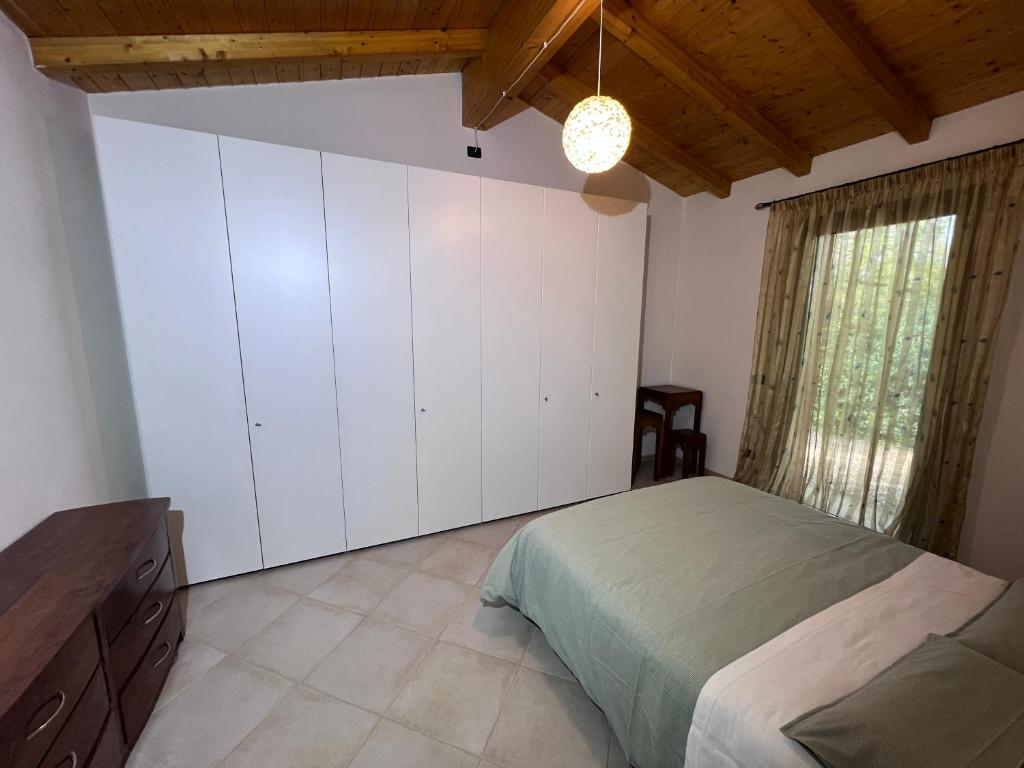 Postel nebo postele na pokoji v ubytování Al Vigneto