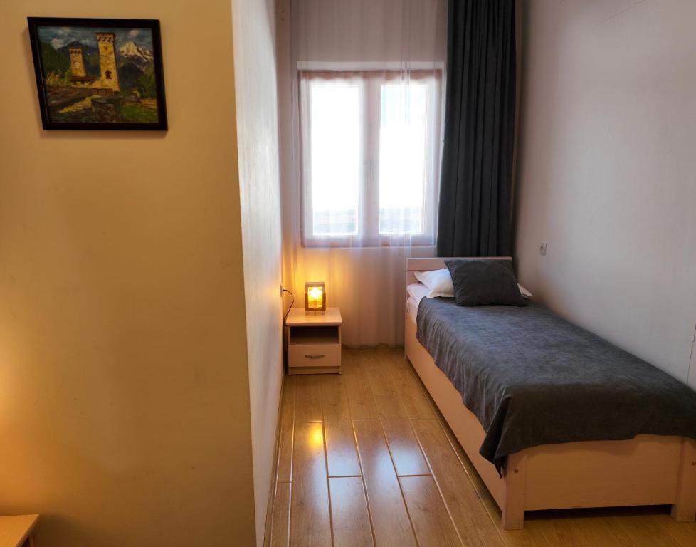 Postel nebo postele na pokoji v ubytování Guesthouse Lanchvali